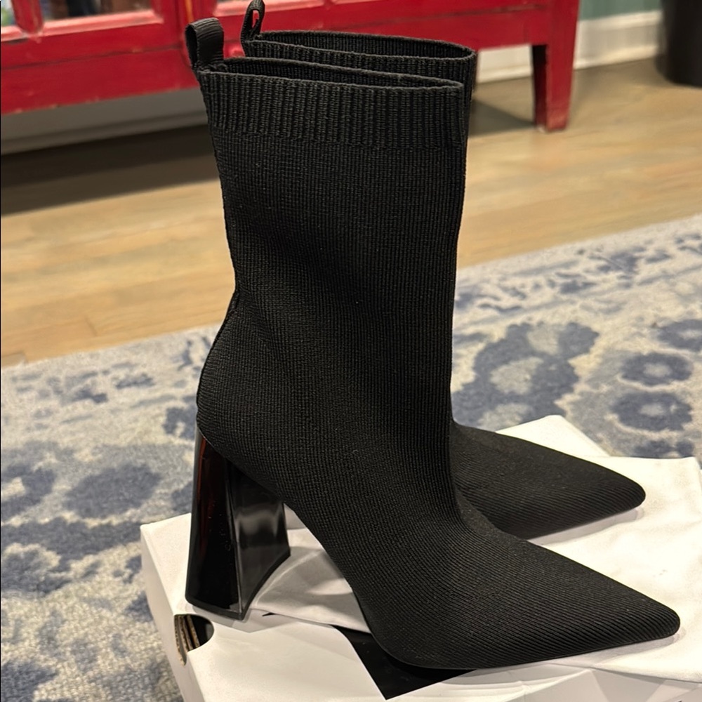 Sleek Black Heeled Boots with Stretchy Knit Fabric